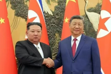 习近平就朝鲜国庆77周年向金正恩致贺电